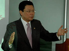 A member of the Korean National Assembly and former minister, Mr Duck-Koo Chung, delivers a talk at the Centre for Research in Rural and Industrial Development in Chandigarh on Monday