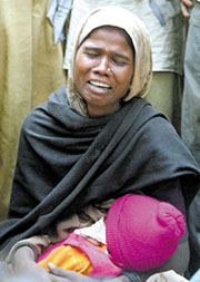 A woman mourning for her relatives at Moti Nagar in the Capital.