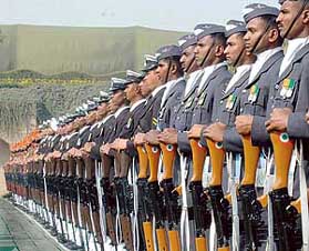 Personnel of the Indian Army, Navy and Air Force pay respects to Mahatma Gandhi at Rajghat on Martyrs Day in New Delhi.