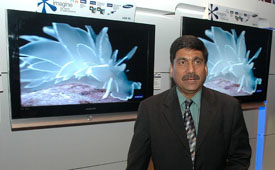 Deputy Managing Director of Samsung India Electronics Ravi Zutshi poses at the launch of the Samsung Flat Panel LCD television in New Delhi on Tuesday.