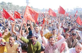CITU workers stage a dharna at Jamalpur Dasehra Ground in Ludhiana on Tuesday