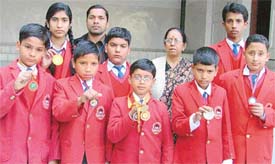 Students of Saraswati Modern School, Ludhiana, display medals won at the Punjab State Kickboxing Championship