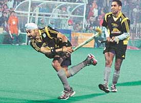 Sandeep Singh of Chandigarh Dynamos scores a goal against Bangalore Lions during the second final of the PHL Tier I at Chandigarh on Tuesday