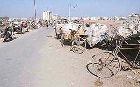 The first alternative route between Panchkula and Mauli Jagran in Chandigarh, which has been encroached upon by junk dealers and garbage collection vehicles