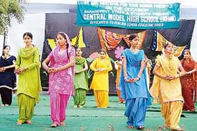 Students of Central Model High School present giddha on the annual function held in Ludhiana