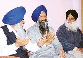 Mr Prem Singh Chandumajra addresses a press conference in Ludhiana