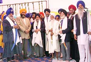 Mr Paramjit Singh Sarna, former DSGMC chief, (third from left) after being honoured by Sikhs in Ludhiana on Sunday.