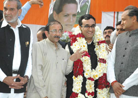 Union Urban Development Minister Ajay Maken being felicitated by DPCC president Ram Babu Sharma and Congress leader Sajjan Kumar in the Capital on Friday