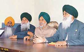 BKU president Ajmer Singh Lakhowal addresses the executive meeting of the union in Ludhiana on Friday. 