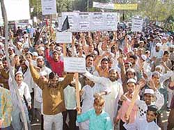 Muslims stage protest against the publication of cartoons of the Prophet in some European newspapers in Ludhiana on Friday. 