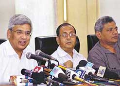 CPM general secretary Prakash Karat (left) addresses a press conference after the conclusion of the two-day CPM Politburo meeting in Kolkata on Friday. Also seen in the picture are West Bengal state CPM secretary Anil Biwas (centre) and Politburo member Sitaram Yechury.