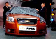 General Motors Vice-President (Global Engineering) Jim Queen and GM Indias President and MD Rajeev Chaba (left) unveil Chevrolet Aveo car at a press conference in Bangalore on Saturday. 