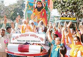 Devotees take out a procession as part of the Ravi Dass Jayanti celebrations in Chandigarh