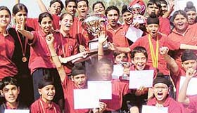 Tagore House students in a jubilant mood after winning the overall trophy in the annual athletics meet of YPS, Mohali