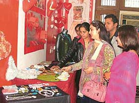 Students of the JD Institute of Fashion Technology admire the exhibits of fellow students during an exhibition in Ludhiana