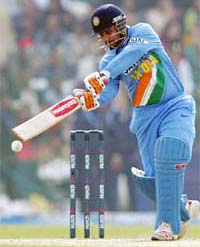 Virender Sehwag hits a boundary during the second one-day in Rawalpindi