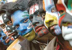 Participants at a face-painting competition, which was organised as part of the Pecfest in Chandigarh