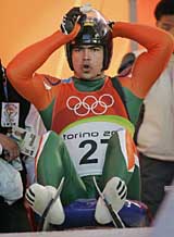 Shiva Keshavan prepares at the start of the first run of the mens singles luge at the Turin 2006 Winter Olympic Games at Cesana Pariol, Italy, on Saturday.