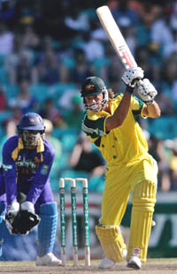 Australias Andrew Symonds hits a boundary during the second one-day final against Sri Lanka in Sydney on Sunday.