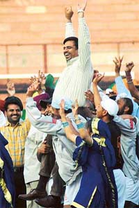 DPI D.S. Mangat is lifted by players at the closing ceremony of the 51st National School Games at Sector 42, Chandigarh