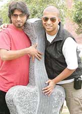Two members of the pop band Taan-Trikz, Ulrich Gomes and Adil Manuel, pose before the Valentines Day concert of the band at Kala Gram in Chandigarh on Tuesday. 