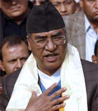 Former Nepalese Prime Minister and President of Nepali congress (Democratic) Party Sher Bahadur Deuba gestures as he addressed a press conference in Kathmandu