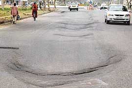 Broken again: The cracked stretch of the road dividing Sectors 46 and 47 in Chandigarh was recarpeted less than two weeks back.