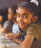 A girl participating in a computer programme run by Drishtee Foundation.