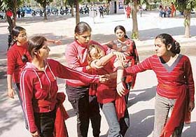 Students of the Government College for Girls, Sector 11, perform a street play on blood donation in Chandigarh