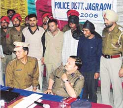 DIG Parag Jain and SSP R.K Jaiswal with the four accused, including Micky Jain(face encircled), in the Reema Jain murder case at a press conference in Jagraon on Thursday