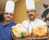 COLOURFUL BOUNTY: Chef Rajib Das (right) with his colleague.