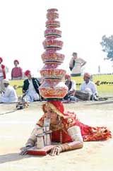 Rajasthani dancers perform at the concluding function of Kila Raipur games on Sunday