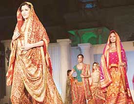 Models display Ritu Kumars collection at a fashion show held during the Heritage Festival in Patiala on Saturday.