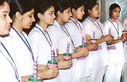 Nursing students during the lamp lighting ceremony at Fortis Hospital, Mohali, on Monday.