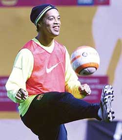 FC Barcelonas soccer star Brazilian Ronaldinho attends a training session at Nou Camp stadium in Barcelona, Spain, on Monday. 