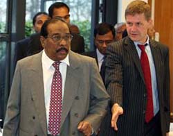 Anton Balasingham, chief negotiator and political strategist of the Liberation Tigers of Tamil Eelam (LTTE), and Erik Solheim, Norwegian Minister of International Development, arrive for a meeting in the Castle of Bossey in Bogis-Bossy near Geneva