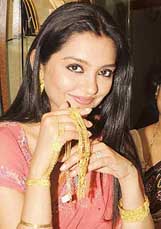 Bengali actress June Maliah poses at the inauguration of a jewellery showroom in Malda, West Bengal, on Thursday. 