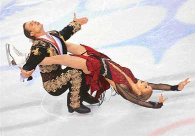 Russians Tatiana Navka and Roman Kostomarov perform on their way to winning the gold medal in the ice dancing event at the Turin Winter Olympics