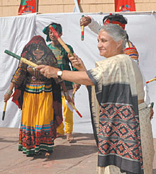 Delhi Chief Minister Sheila Dikshit doing a Dandia dance after inaugurating the Delhi Government's Bhagidari Utsav-06 at Pragati Maidan in the Capital on Saturday.