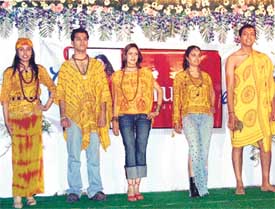 Students take part in a fashion show during a function in Ludhiana on Saturday