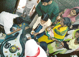 Devotees offer milk to Lord Shiva at Pracheen Shiv Mandir, Sector 24, on Shivratri in Chandigarh on Sunday.
