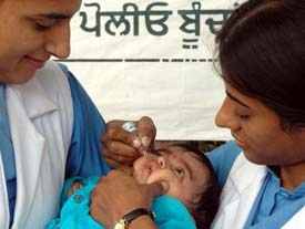A child being given polio drops at a booth in Civil Lines in Ludhiana on Sunday