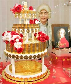Japanese jewellery shop Ginza Tanaka unveils a 250 million yen ($2.15 million) cake, made of Vienna gold coin, to celebrate the 250th birth anniversary of Austrian composer Wolfgang Amadeus Mozart in Tokyo