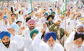 Activists of Bharti Kisan Union  protest at Matka Chowk, Chandigarh, on Tuesday