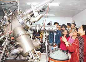 Students look at a bio-molecular electronics machine at the CSIO, Sector 30, Chandigarh, on Tuesday