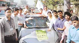Students of the PCTE at a car rally to spread the message of peace in Ludhiana on Tuesday