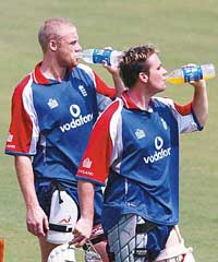 Englands Andrew Flintoff and Ian Blackwell take a drinks break during a practice session in Nagpur on Tuesday
