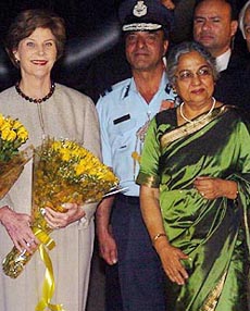 Prime Minister Manmohan Singhs wife Gursharan Kaur with Laura, wife of US President George W. Bush, at the Palam Air Force Station in New Delhi on Wednesday. 