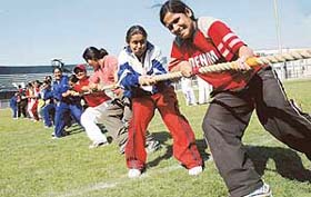 Students of MTSM College take part in a tug-of-war during the annual athletics meet at Guru Nanak Stadium in Ludhiana