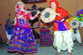 Students of B D Arya Girls College present a cultural item during the annual prize distribution function in Jalandhar